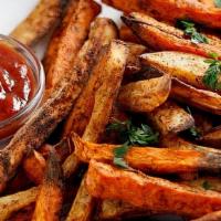 Sweet Potato Fries · Crispy sweet potato fries lightly tossed in sugar. Served with Belly sauce.