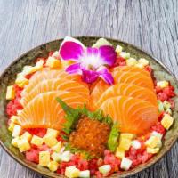 Salmon Chirashi Bowl · 8 oz. fresh salmon, tuna groun , ikura, tobiko, tamago, cucumber, shredded nori, pickled gin...