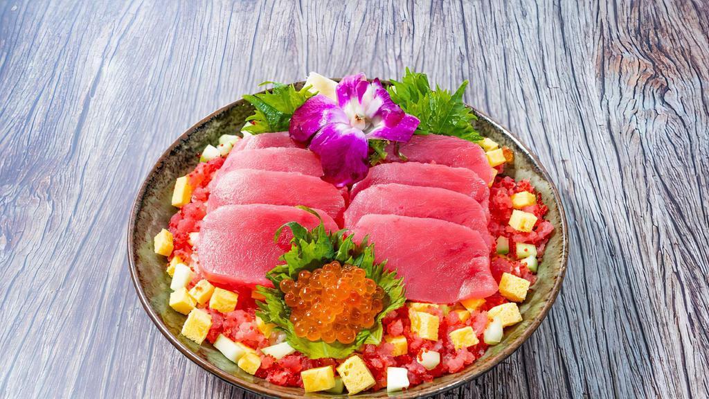 Ahi Tuna Chirashi Bowl · 8 oz. ahi tuna, tuna ground ikora, tobiko, tamago, cucumber, shredded nori,  pickled ginger  and wasabi