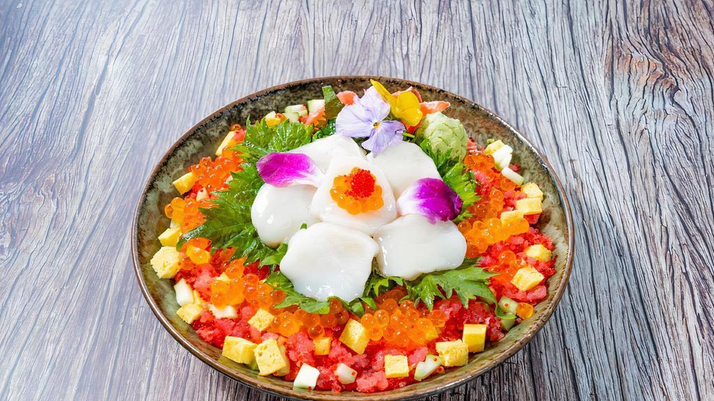 Scallop Chirashi Bowl · Hokkaido scallop , tuna ground, ikura, tobiko, tamago, cucumber, shredded nori, pickled ginger and wasabi.