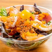 Sashimi Salad · Spring Mix , Salmon ,Ahi Tuna and Yellowtail ( 2 Slices of Each ), Masogo ( Flying Fish Eggs...