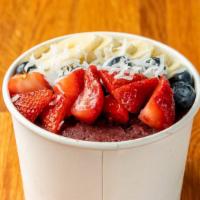 Acai Bowl · Blended acai with strawberries, banana and a splash of coconut milk. Topped with two layers ...