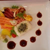 Chirashi · Assorment sliced of fresh raw fish
on a bed of sushi rice