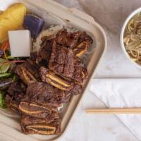 Kalbi Short Ribs · With either kalua pig and cabbage or chicken long rice.