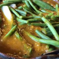 Kare Kare · 32 oz. stewed oxtail with vegetables. Contains peanut butter.
