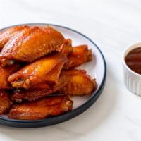 Honey Bbq Wings · Perfect party wings with tasty Honey BBQ sauce. Comes with celery and bleu cheese.