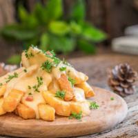 Cheesy French Fries · Delicious French fries with creamy cheese whiz.