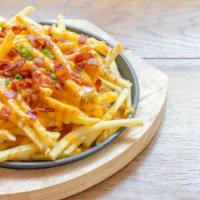 Bacon Ranch Fries · Crispy bacon and ranch topped on crispy fries.