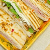 Soprano Panini · Baked eggplant or Grilled chicken, Fresh Mozzarella, Baby Spinach, Roasted Red peppers, Bals...