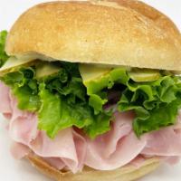 Ham Sandwich · With lettuce, tomato, onion, oil, vinegar, salt, pepper and oregano.