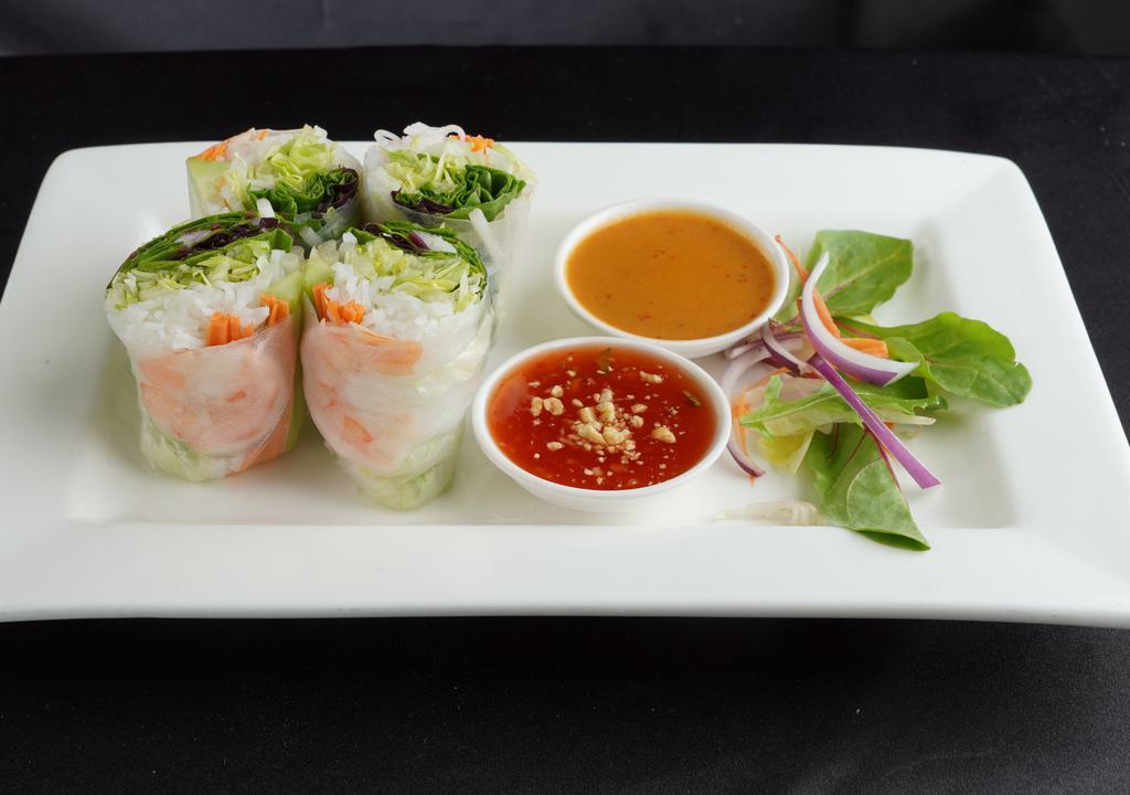 Fresh Summer Roll · Wrapped shrimp, carrots, bean sprouts, cucumbers, rice noodles, and lettuce. Served with sweet chili and peanut sauce.