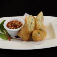 Veggie Roll · Wrapped and deep-fried mixed veggies and glass noodles. Served with sweet chili sauce.