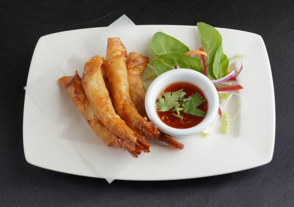 Shrimp Blanket · Fried shrimp wrapped in rice paper. Served with sweet chili sauce.