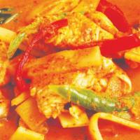Red Curry (Gang Dang) · Spicy. 

Red curry with bamboo shoots, peppers, fresh Thai basil, and mushrooms in coconut m...