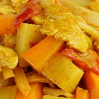 Yellow Curry (Gang Garee) · Yellow curry with carrots, potatoes, white onions, and peppers in coconut milk. Served with ...