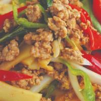 Thai Style Ga Prow · Sauteed minced protein with garlic, Thai basil, onions, peppers, and bamboo shoots in spicy ...