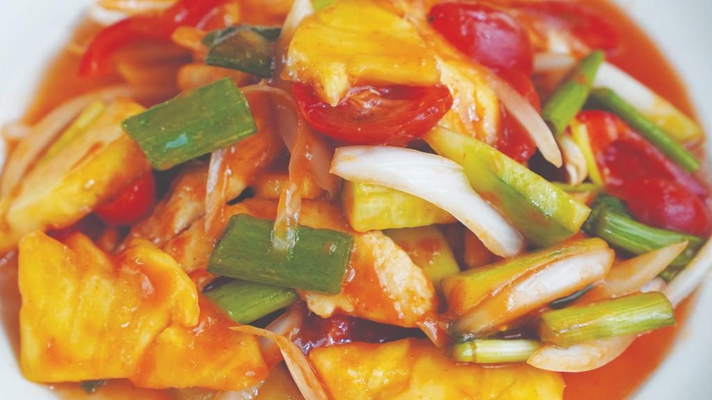 Pad Prew Wan · Sauteed protein with pineapples, onions, tomatoes, peppers, and cucumbers in Thai sweet and sour sauce. Served with Jasmine rice.