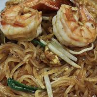 Pad Thai · Thin rice noodles stir-fried in tamarind sauce with eggs, bean sprouts, chives, crushed pean...