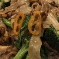 Pad Khee Mao (Drunken Noodles) · Flat rice noodles stir-fried in brown sauce with eggs, mushrooms, broccoli, Asian greens, to...