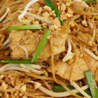 Pad Mee Korat · Thin rice noodles stir-fried in brown bean sauce with eggs, bean sprouts, chives, crushed pe...