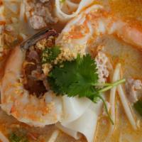 Tom Yum Noodle Soup · Lemongrass soup with flat rice noodles, bean sprouts, green onions, cilantro, crushed peanut...