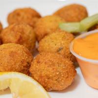Hush Puppies (10) · 10 pieces. Fried to perfection. These Hush Puppies pair with spicy Mayo are sure for you to ...