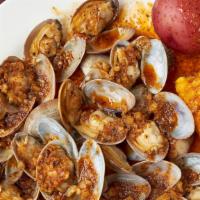 Large Catch Clam · 1 lb fresh clams tossed in flavorful seasoning and spice of choice. Served with corn and pot...