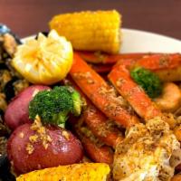 The Perfect Storm · 0.5 lb snow crab legs, 1 lb shrimp head off, and 1 lb black mussel, tossed in flavorful seas...