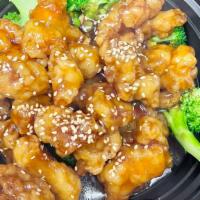 Sesame Chicken · Comes with side of white rice