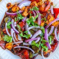 Chilli Paneer Dry · Fried homemade cottage cheese with diced bell pepper, onion and chili sauce