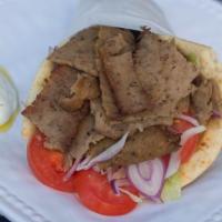Krave Pita · Your choice of meat, tomato, lettuce, and onion with tzatziki sauce.