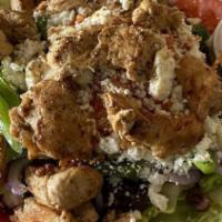Greek Salad · Be prepared for the best Greek salad on the planet. Freshly chopped romaine lettuce, Roma pl...