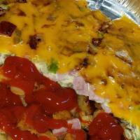 Western Omelette · Delicious blend of diced ham, peppers and onions. Served with toast and choice of home fries...