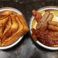 French Toast Combo · Four triangular pieces. Two eggs, two sausages and two bacon strips.