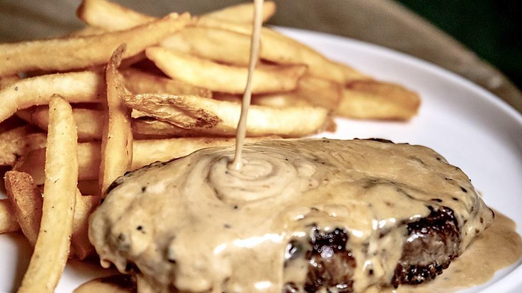 Steak Au Poivre · Organic New York Strip angus beef, peppercorn, and Hennessy VSOP cream sauce. Served with fries.