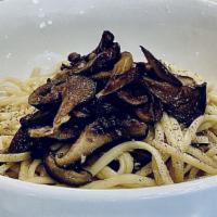 Wild Mushroom Linguine · Wild mushroom cream sauce, roasted garlic, porcini butter.