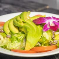 La Sensación House Salad · Baby greens, tomatoes, red onions, olives, cucumbers, red peppers served with a zesty lemon ...