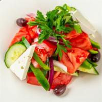 Classic Greek Salad · Prepared with vine-ripe tomatoes.