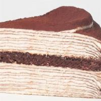 Tiramisu Mille Crepes · Layers of crêpes and crème pâte à bombe meets mascarpone and cocoa powder. A late summer del...