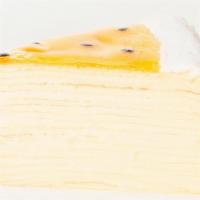 Passion Fruit Mille Crepes · No less than twenty layers of handmade crêpes with layers of passion fruit-infused cream off...