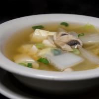 Tofu Soup · Clear broth, soft tofu, onion and glass noodle.