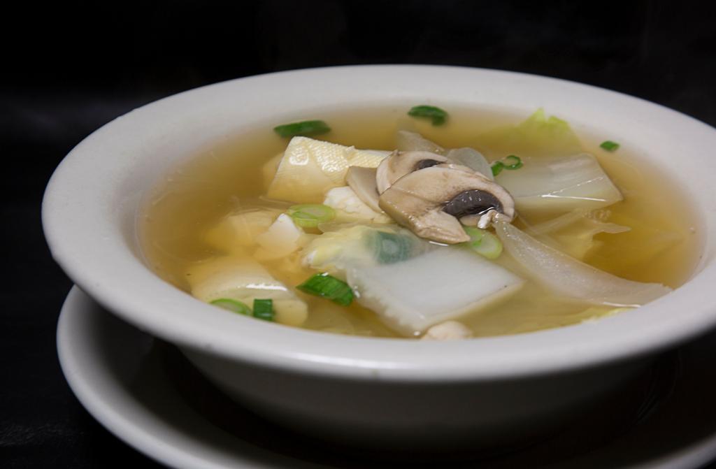 Tofu Soup · Clear broth, soft tofu, onion and glass noodle.