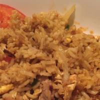 Pineapple Fried Rice · Pineapple, egg, tomato, onion, curry spice and cashew nut.