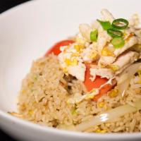 Thai Fried Rice · With egg, tomato and onion.