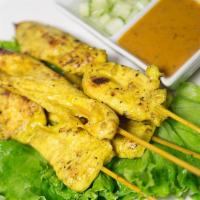 Chicken Satay · Skewers of grilled chicken served with peanut sauce.