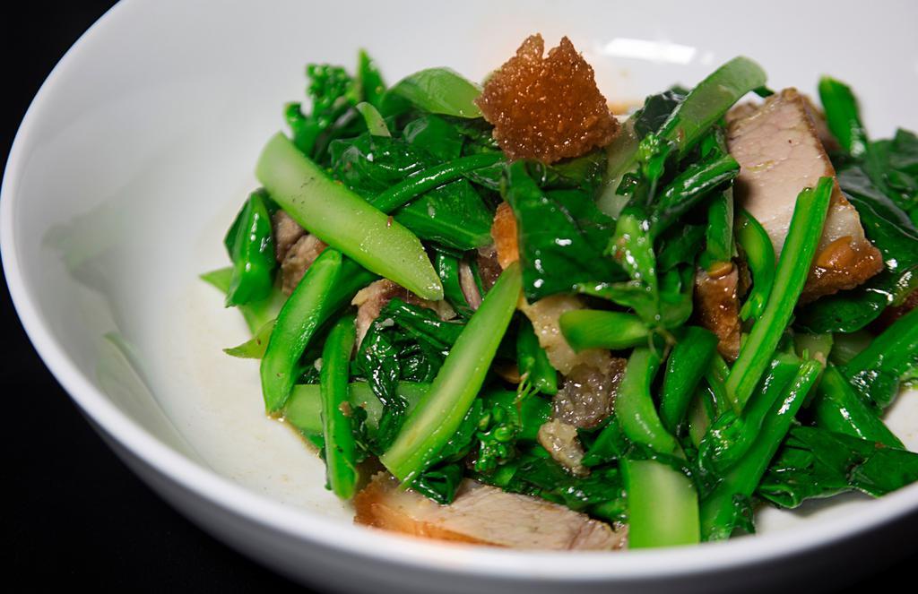 Crispy Pork Kana · Crispy pork belly sauteed with soy sauce and Chinese broccoli.