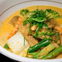 Vegetarian Duck Panang · Mock duck, soybean extract in panang curry, coconut milk and mixed vegetables.