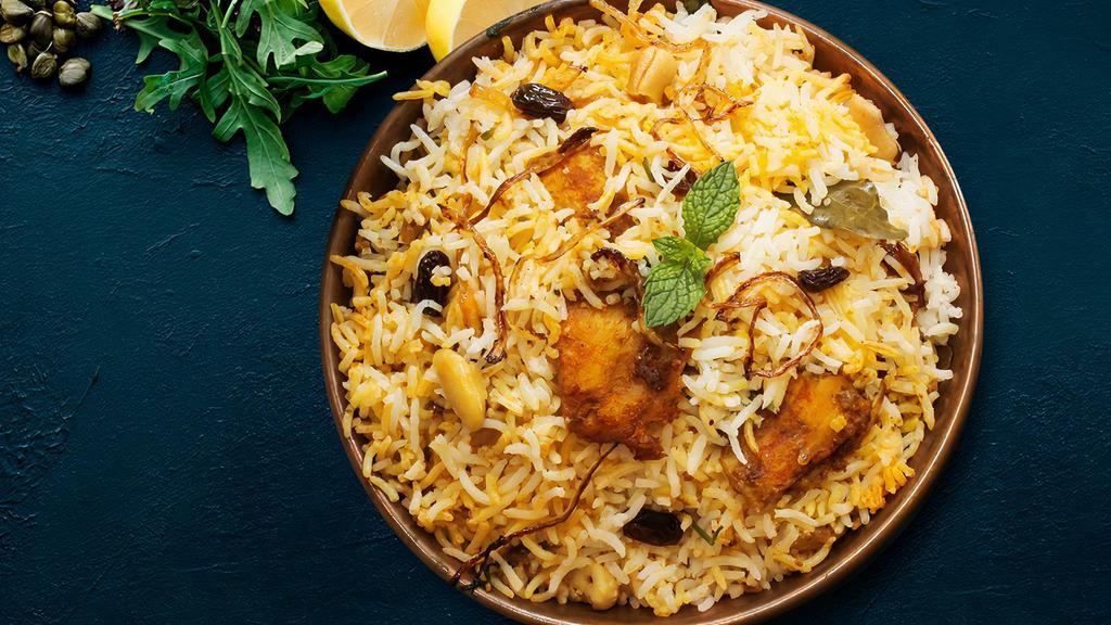 Asli Hyderabadi Boneless Kodi (Chicken) Biryani · Spicy long grained basmati rice cooked with aromatic biryani spices, herbs and juicy boneless chicken pieces , cooked in thick bottomed vessel