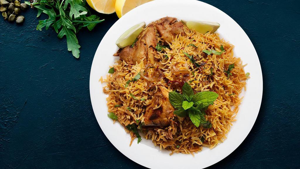 Fb'S Kodi (Chicken) Biryani · Spicy basmati rice cooked in biryani spices herbs and juicy chicken leg pieces