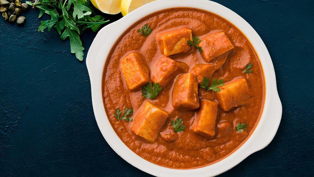World Famous Paneer Tikka Masala · Delightful grilled paneer flavored with spiced tomato onion curry sauce